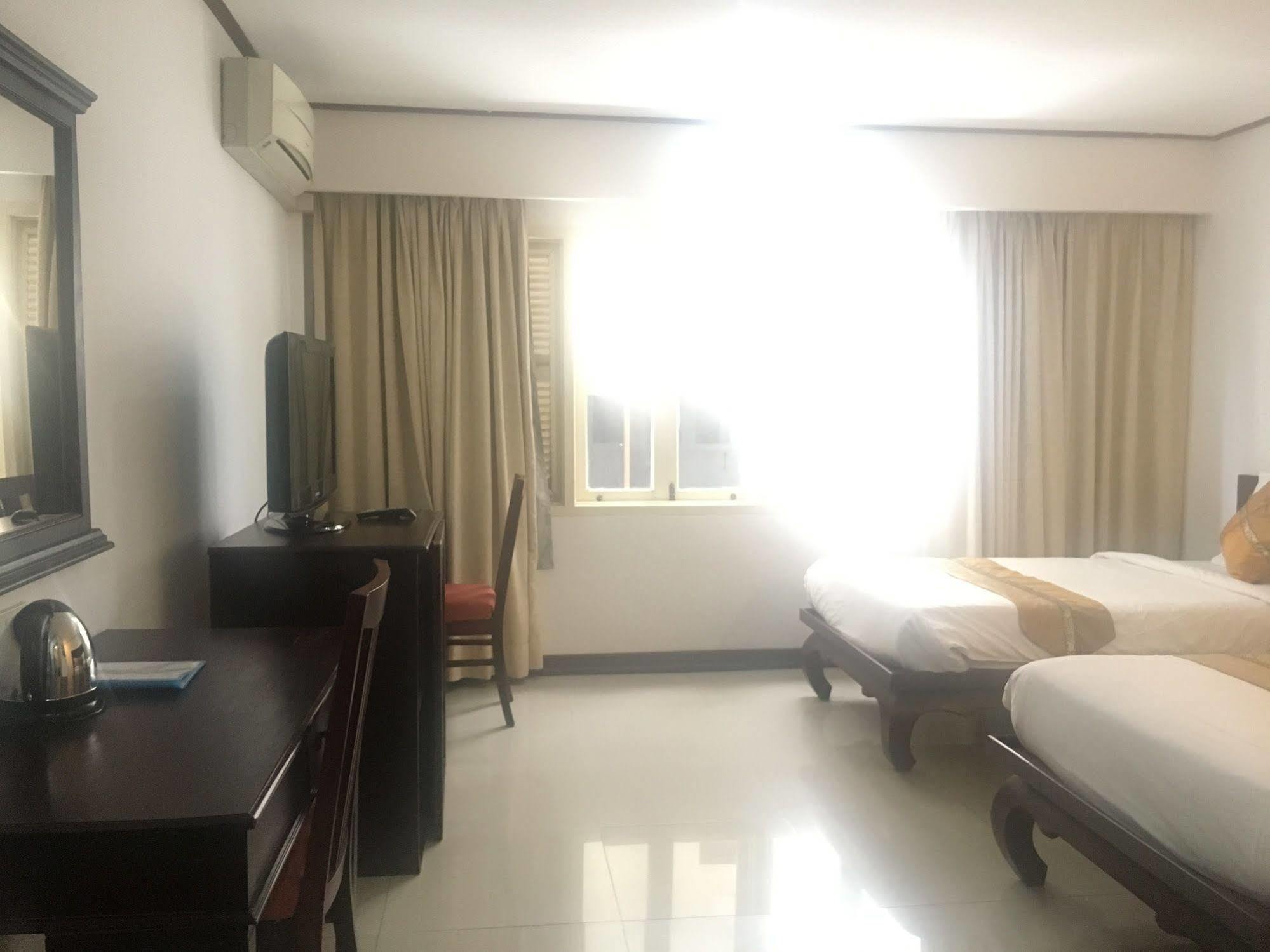 Av Hotel Вьентьян Экстерьер фото